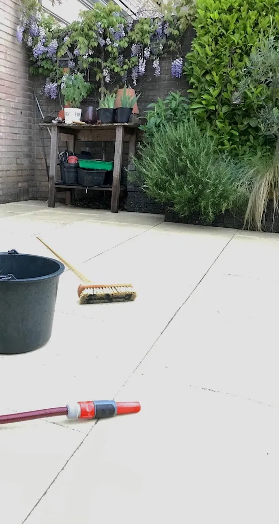 Scrub the dirt off the tiles with (hot) water and a scrub brush